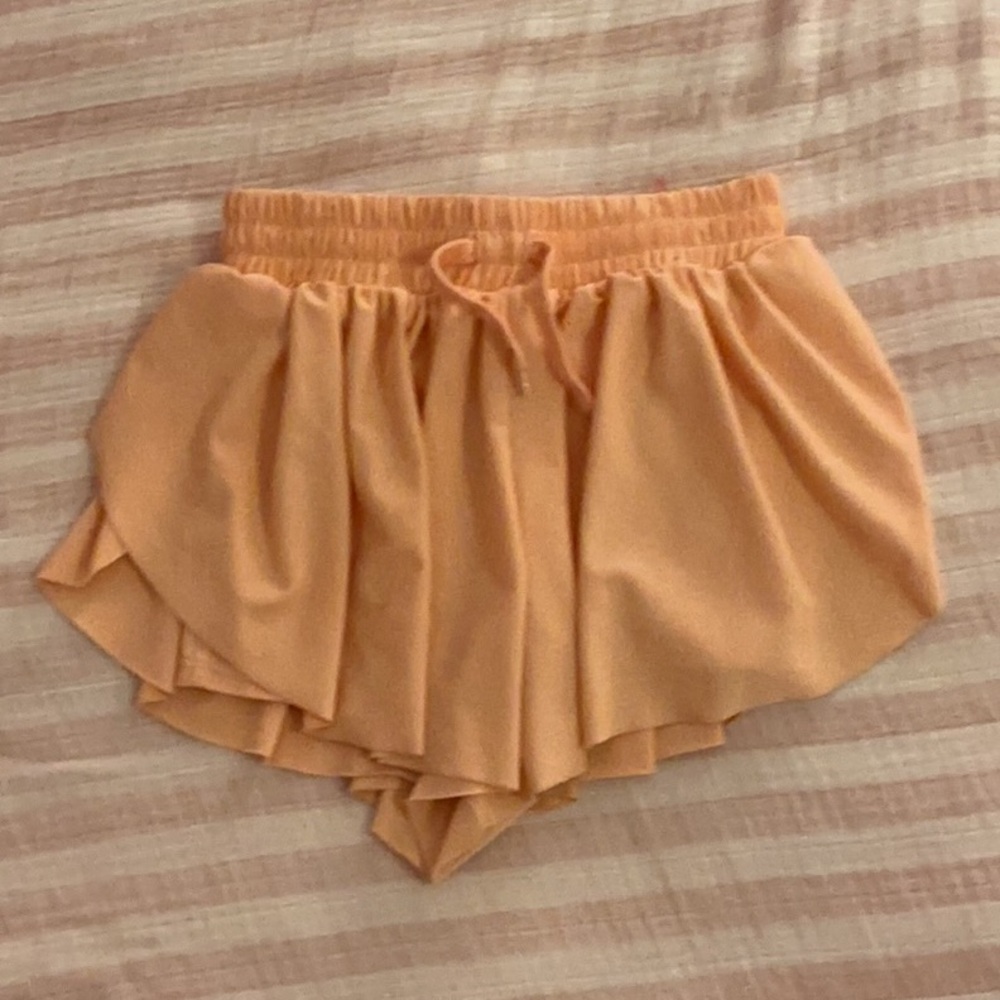 Light orange butterfly shorts 8 year old